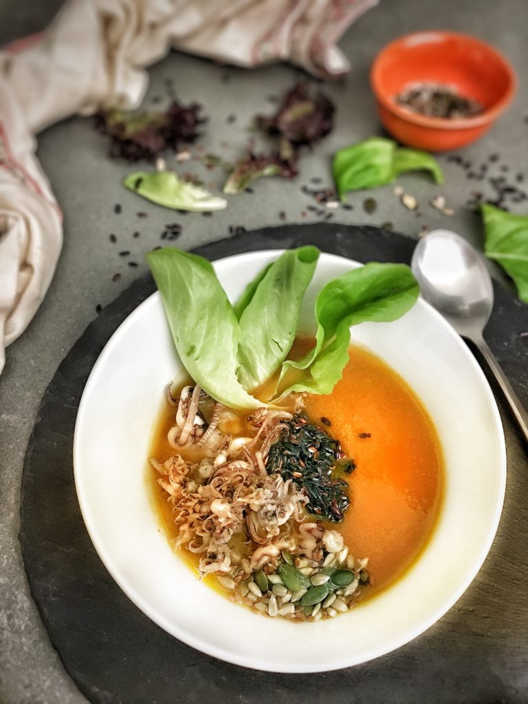 crema di zucca riso nero waxy e calamaretti